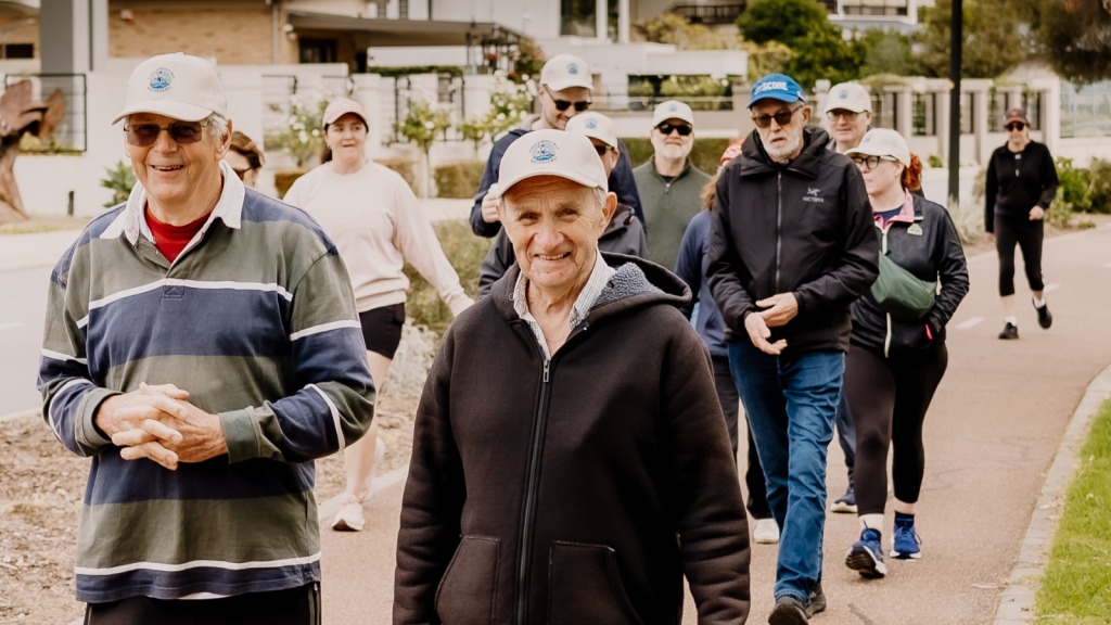 Community members walking together during the 2026 Blokes & Bridges Walk in Perth.